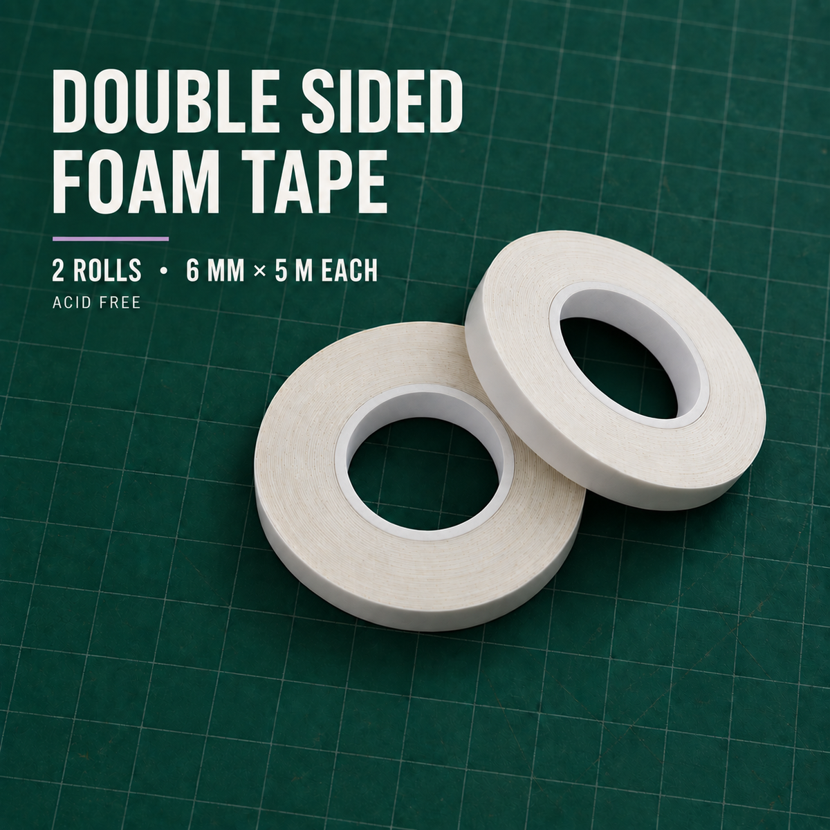 Two rolls of double-sided foam tape on a green cutting mat background
